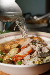 cooking noodle thai street food