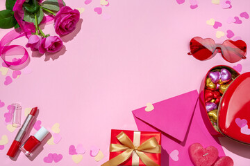 Holiday background with gifts and candy. Romantic date on Valentine's day.