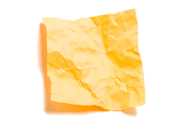 Yellow piece of  crumpled paper