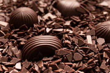 Candies in chocolate chips close-up macro photography.