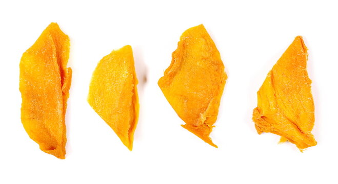 Set dried mango fruit slices isolated on white, top view