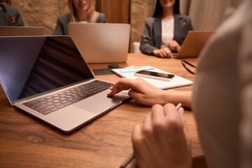 Ladies working in the office, conference with director