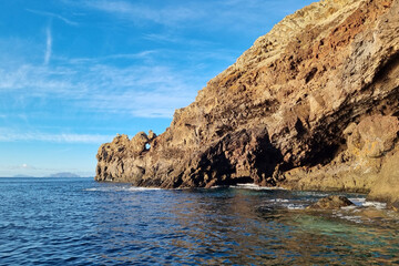 Fototapeta na wymiar The beautiful yellow cliffs of madeira island in Portugal.