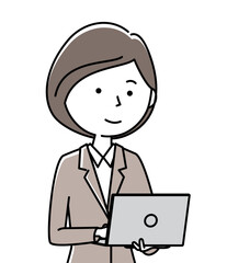 ノートPCを操作するスーツの女性