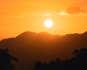 Golden sunset landscape between mountains from puerto rico 