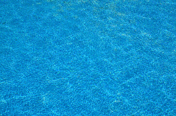 Swimming pool blue water abstract  background texture.Summer vacation or relax concept.Selective focus.