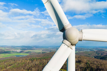 wind turbine in the wind over the beautiful landscape