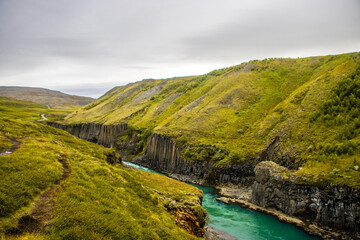 Studlafoss and Studlagil Basalt Rock Columns  Canyon Dramatic Landscape river in Jokuldalur, Iceland