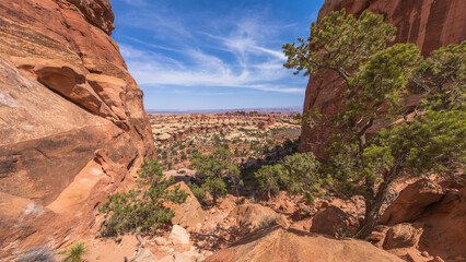 hiking the chesler park loop trail in the needles in canyonlands national park, usa