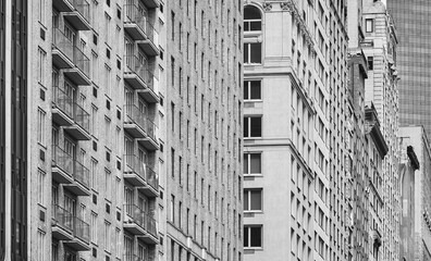 Black and white photo of New York City diverse architecture, USA.