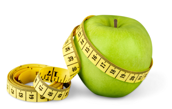 Green apple with a yellow measuring tape