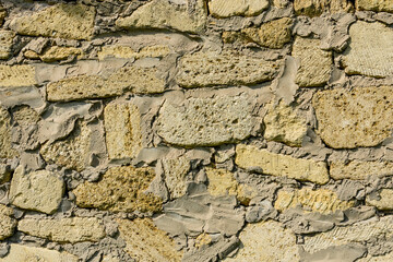 Texture of the shell rock limestone bricks for background. Natural pattern