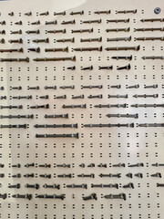 Screws on display in a vertical panel
