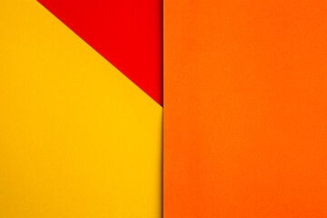 Paper color yellow, orange and red abstract background. Multicolored backdrop from colored cardboard. Paper colorful background. Texture for design.