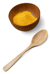 Asian orange spices in a wooden plate with a wooden spoon