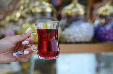 Hot tea in a Turkish candy store as a treat for tourists