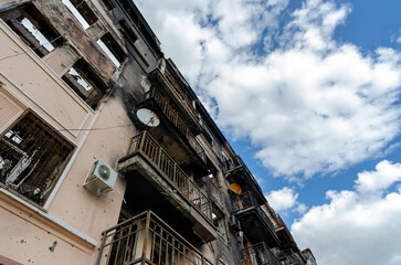 destroyed and burned houses in the city during the war in Ukraine