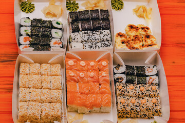 Various rolls in boxes. Food delivery Japanese cuisine.
