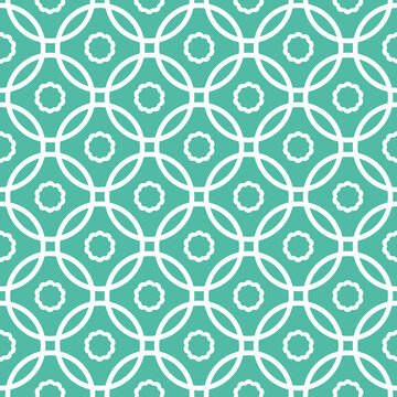 White Interlocking Circles on green Background. Rings pattern seamless. Geometric white overlapping circles and flowers design abstract background.	