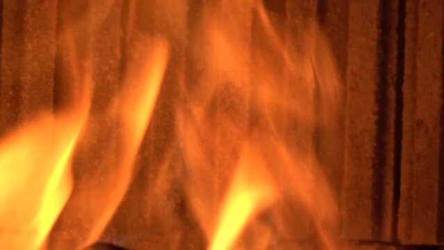 Background. Motion shots of flames in the stove.