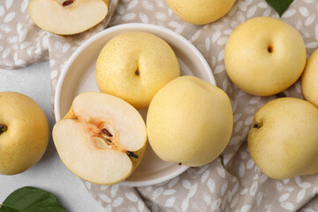 Naklejka na ściany i meble Delicious apple pear on table, flat lay
