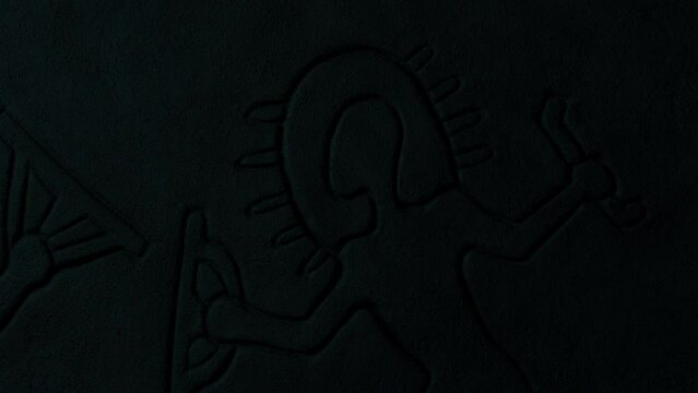 Ancient Aliens Carving Lit Up In Dusty Cave