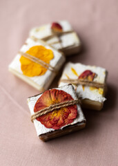 Natural handmade soaps with organic dried rose petals. An ethical, sustainable lifestyle without waste. Corporate or personal gift idea. Present for Women's Day, Valentine's Day, Mother's Day.