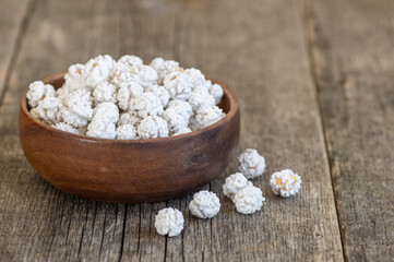 White sugar coated roasted chickpeas, turkish traditional nuts, round small confectionery