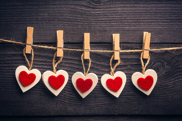 white red heart on the twine with clothespins