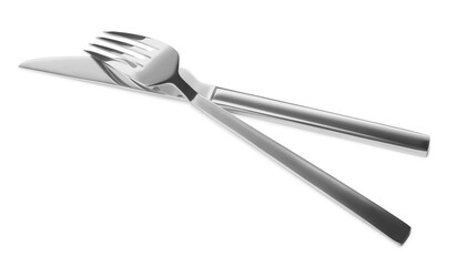 Fork and knife isolated on white. Stylish shiny cutlery set