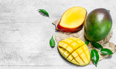 Ripe mango on paper.