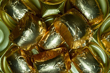 chocolate candy in golden foil 