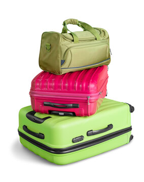 Three full and closed suitcases, ready for the trip,