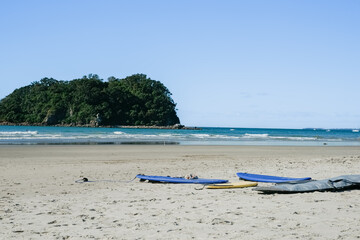 Surf boards left on Beach in summer as a background image