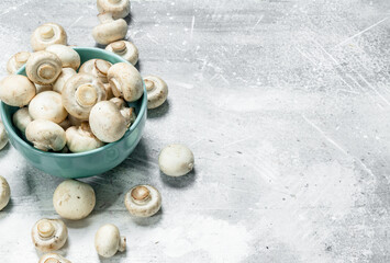 Fresh fragrant mushrooms in bowl.