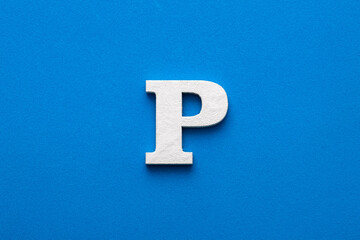 Letter P uppercase - White wood font on blue foamy background