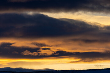 Dramatic Orange Sunset During Storm, Bozeman Montana Sunset January 2023