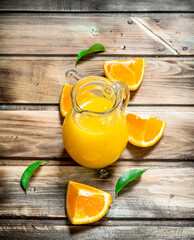 Orange juice in the pitcher.