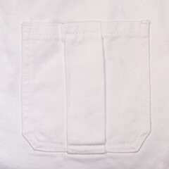 Fototapeta na wymiar Close up of white jeans texture with pocket. Abstract denim cotton fabric