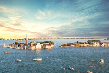 Beautiful view of the gondolas and the Cathedral of San Giorgio Maggiore, on an island in the Venetian lagoon, Venice, Italy