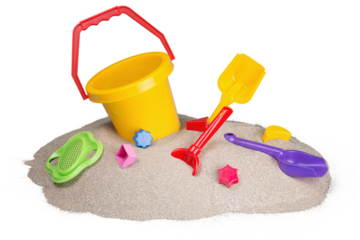 Colored toys for sandbox  in golden beach sand