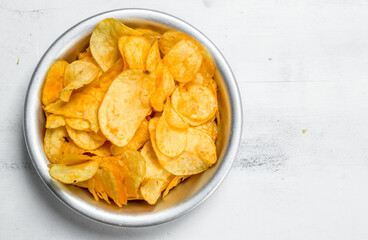 Potato chips in the bowl .