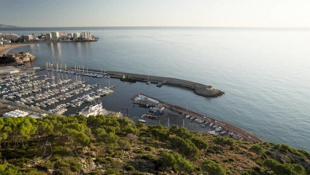 Slow 4K drone fly by aerial video of Oropesa del Mar sport port in the Mediterranean Sea in Spain