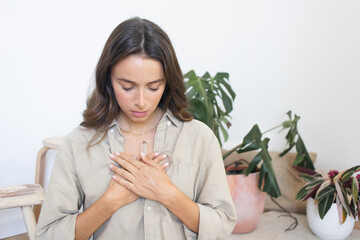 Woman Meditating at Home Healing Spirituality