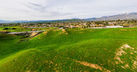 A Beautiful Green Valley in Yucaipa, Southern California, after Steady Rain helps the dry hills grow Grass