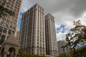 Fototapeta na wymiar New Cadillac Square Apartments, a Beaux-Arts architectural style residential building built in 1927 in downtown Detroit, Michigan during an autumn afternoon, September 2022.