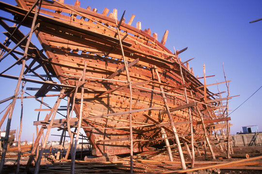 wooden boat in cradle/staging
