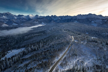 Aerial view of Polish Tatra Mountains in the winter © itardiusz