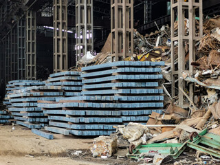 Naklejka premium steel billets in the steel plant warehouse.