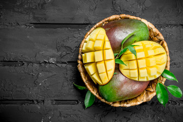 Aromatic fresh mango in a basket.